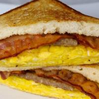 Bacon, Sausage, Eggs · Comes with 2 eggs scramble, bacon, sausage & choice of white or wheat bread.