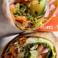 Veggie Sandwich Wrap · Whole wheat wrap, sprouts, roasted red peppers, green pepper, onions, lettuce, tomatoes & av...
