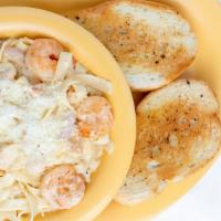 Louisiana Pasta · Grilled chicken & shrimp, onions, bell peppers, alfredo sauce.
