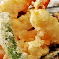 Tempura · Vegetarian. Lightly battered and fried choice of shrimp, vegetable or combination.