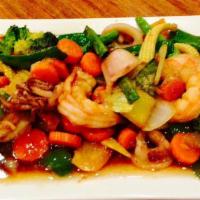 Seafood With Chili Mixture* · American spicy. Assorted seafood and vegetable in chili paste and sweet basil.