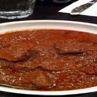 Keye Wot · Cooked Beef with Berbere stew simmered in Ethiopian
spices and butter