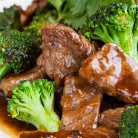 Beef & Broccoli · Marinated beef in oyster sauce and broccoli. Served with steamed rice.