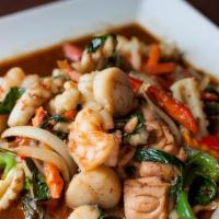 Pad Prik · Onions, scallions, carrots, bell peppers and hot chili. Stir-fried in light chili sauce. Ser...