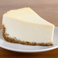 Plain Cheesecake · Creamy, rich NY-style cheesecake.