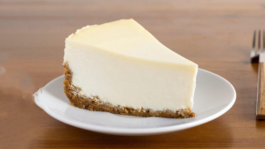 Plain Cheesecake · Creamy, rich NY-style cheesecake.