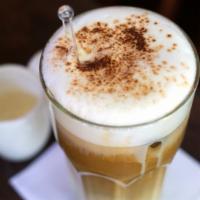 Iced Cappuccino · Rich, dark espresso with steamed milk foam over ice.