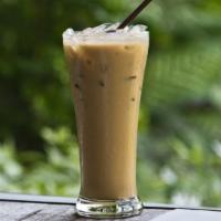 Iced Mochaccino · Dark espresso, steamed milk and rich chocolate over ice.