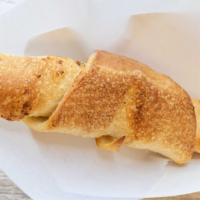 Cheese Garlic Bread · Served with marinara sauce.