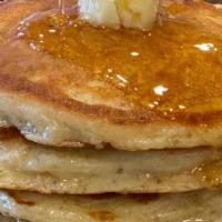 Buttermilk Pancakes · Served with butter and maple syrup.