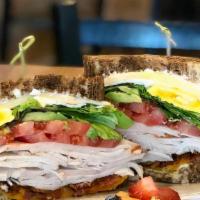 Crickles Turkey Club Sandwich · Toasted marble rye, turkey, applewood bacon, fried egg, Cheddar and Muenster cheese, tomato,...