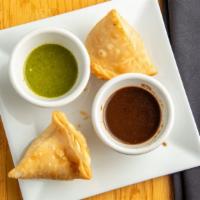 Vegetable Samosa (2 Pcs.) · Fritter stuffed with potatoes and green peas.