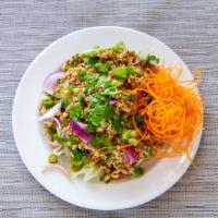 Larb Kai · American Spicy. Minced chicken tossed with red onions, scallion, rice powder, lime juice, an...