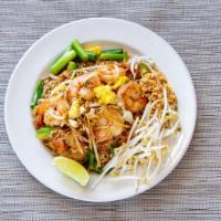 Kid’S Pad Thai · Thin noodles stir-fried with chicken, egg, peanut in tamarind sauce.