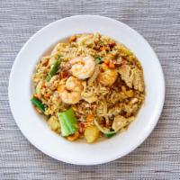 Pineapple Fried Rice  · Chicken& shrimp stir-fried with rice, egg, pineapples, carrots, onions, scallions, cashew nu...