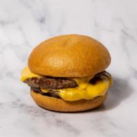 Double Cheese · Two smaller patties 2 slices of American cheese, Pickles and our House-made smoked paprika g...