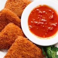 Mozzarella Triangles (4) · Whole milk mozzarella, double breaded and fried golden brown. Served with a side of tomato-b...