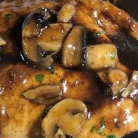 Chicken Or Veal Marsala · All-natural chicken or veal sautéed in a rich mushroom Marsala wine sauce, served with potat...