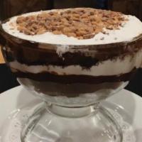 Homemade Heath Bar Truffle · Layers of chocolate crumbled cake, chocolate pudding,  cool whip, and milk chocolate heath c...