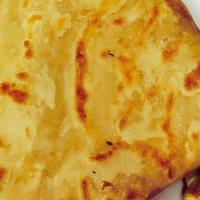 Paratha · Our wheat flat bread is made from scratch and then cooked to fit your taste buds.