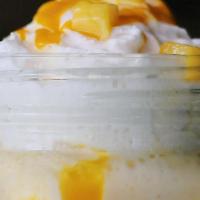 Mango Lassi  · A lovely blend of Mango Pulp & Yogurt.