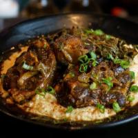 Oxtails & Grits · Braised Oxtail, Cheese Grits, & Smoked Turkey Collards