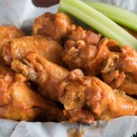 Buffalo Wings · 8 jumbo wings.  with choice of sauces; hot, mild, barbeque, old bay or garibaldi's sauce.