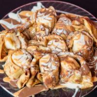 Carmel Apple Crepe · Apples, carmel topped with white chocolates.