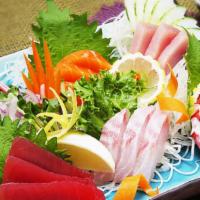 Sashimi Deluxe · Tuna, Salmon, Yellowtail,  Snapper, Sweet Scallop & Ono