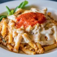 Baked Ziti · Ziti pasta with ground beef baked in creamy rose sauce with a touch of ricotta, topped with ...