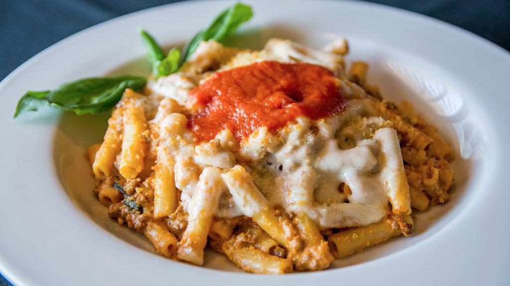 Baked Ziti · Ziti pasta with ground beef baked in creamy rose sauce with a touch of ricotta, topped with mozzarella cheese, and baked in a creamy rose sauce.