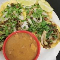 22 Especial Mini Tacos · Four mini tacos (fajita or pastor). with grilled onions, charro beans.
 Four mini tacos (faj...