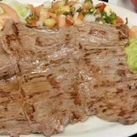 00  Rancherito Special · Beef skirt, served with charro beans, guacamole & pico de gallo.
 bistek entero con frijoles...