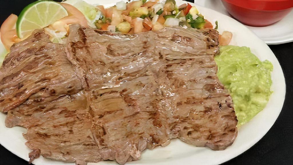 00  Rancherito Special · Beef skirt, served with charro beans, guacamole & pico de gallo.
 bistek entero con frijoles charros, guacamole y pico de gallo.
