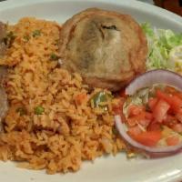 Chile Relleno · Battered poblano pepper with your choice of ground beef or Mexican cheese, served with rice,...