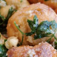 Garlic Knots (With Marinara) (6 Pieces) · Fresh Baked dough knots covered with real melted butter, fresh chopped garlic and fresh pars...