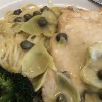 Chicken Piccata · Sautéed medallion of chicken topped with lemon butter sauce.