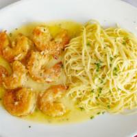 Shrimp Milano · Six lightly breaded shrimp sautéed in garlic lemon butter sauce.