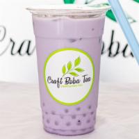 Taro Berry Burst · Caffeine Free. Taro and Strawberry Flavored Milk Tea with Yogurt Popping Boba.
