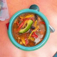 Smoked Chicken Tortilla Soup · Roasted corn and tomato broth, mesquite smoked chicken. Onions, carrots, peppers, avocado, M...