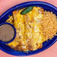 Beef Enchiladas · Spicy ground beef topped with chili con carne and cheese blend.