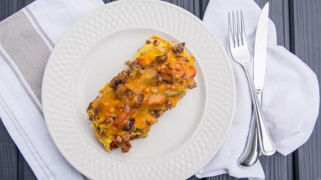 Meat Lover'S Omelette · Bacon, pork sausage, shredded beef ham, onions, green peppers, and Cheddar cheese.