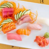 Sushi & Sashimi Combo · Four pieces of sushi, four pieces of sashimi, and one California roll.