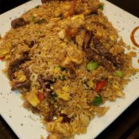 Arroz Chaufa Mixto · Mixed rice. chicken and beef