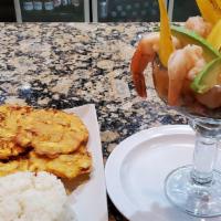 Ceviche De Camarones · Shrimp cocktail. Fried plantain.