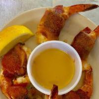 Shrimp Diablo · Jumbo shrimp stuffed with jack cheese and Jalapeño pepper, wrapped in hickory smoked bacon a...