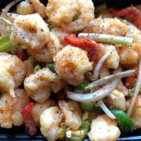 Black Pepper Shrimps · Fresh fried shrimps in black pepper seasoning stir fried with sweet peppers and onions and g...