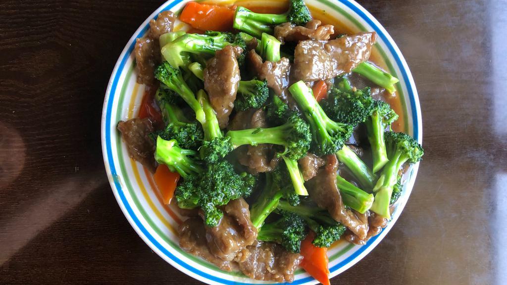 Beef With Broccoli · Mixed of tender strips of steak and healthy broccoli, carrots. Come with delicious sweet and savory sauce.