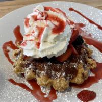 Very Berry Medley · Pearl sugar waffle, strawberries and blackberries, raspberry coulis, whipped cream.
