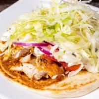 Gyro · Served with lettuce, tomatoes, onions and homemade white sauce.